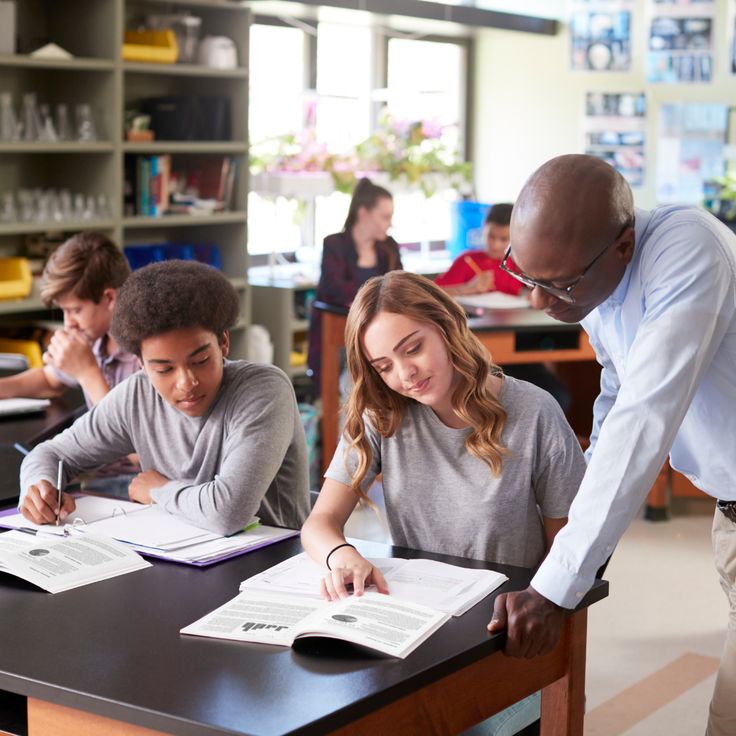 Tutor helping student